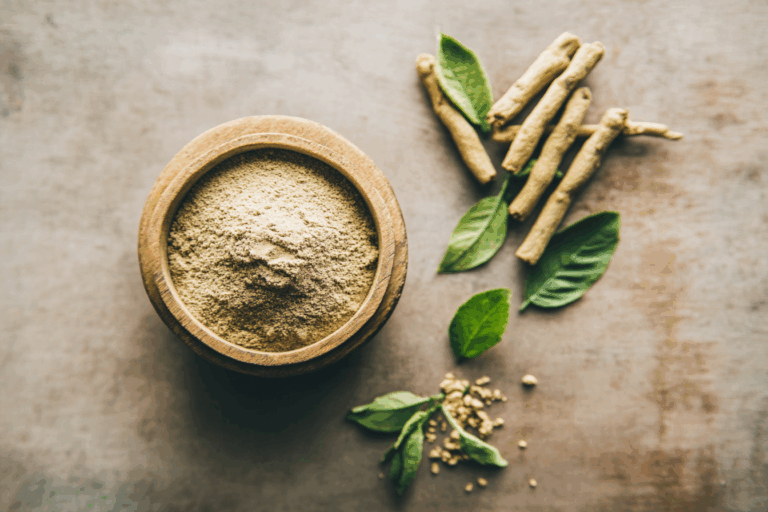 Fresh and dried ashwagandha roots with powdered ashwagandha in a bowl – Withania somnifera herbal profile